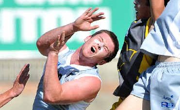 In action: AFL action was hot at the stadium. In action: AFL action was hot at the stadium.